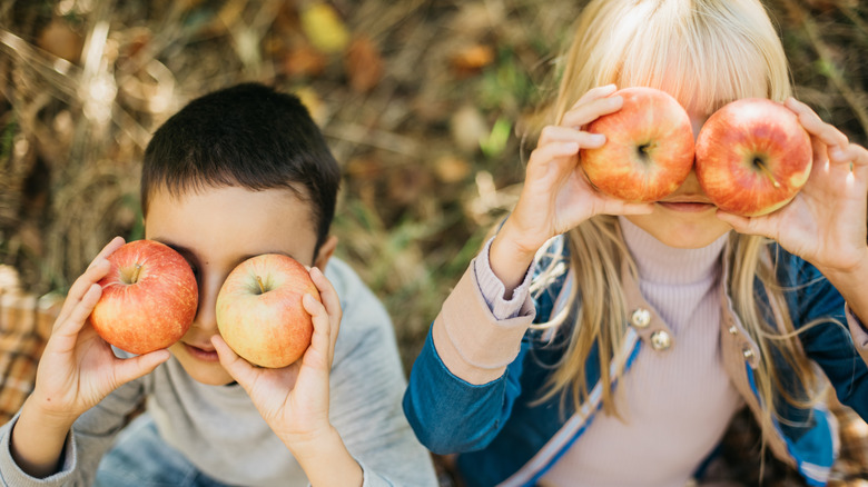 Children in apple orchard