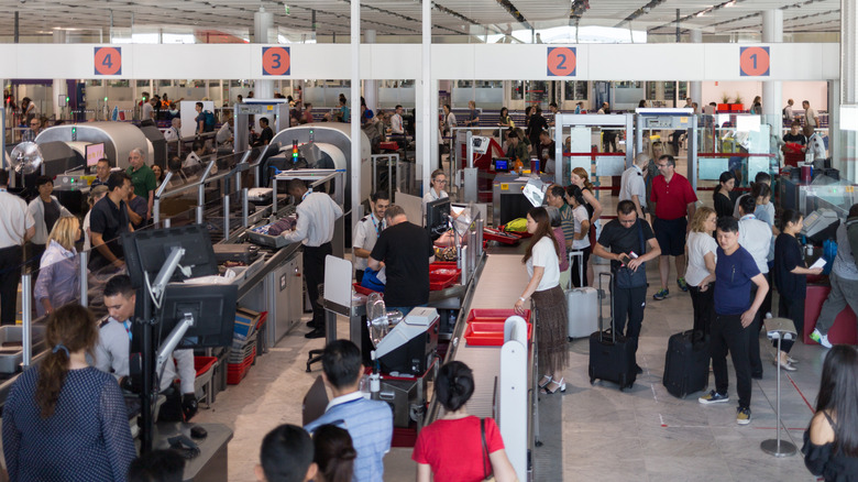 Paris CDG security checkpoint crowd