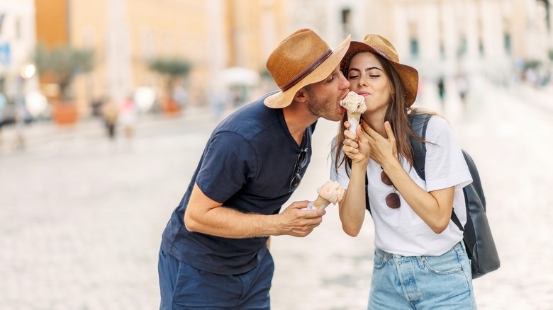 Couple sharing gelato in Rome