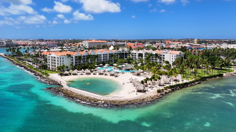 aerial view of Caribbean beach with houses on shore