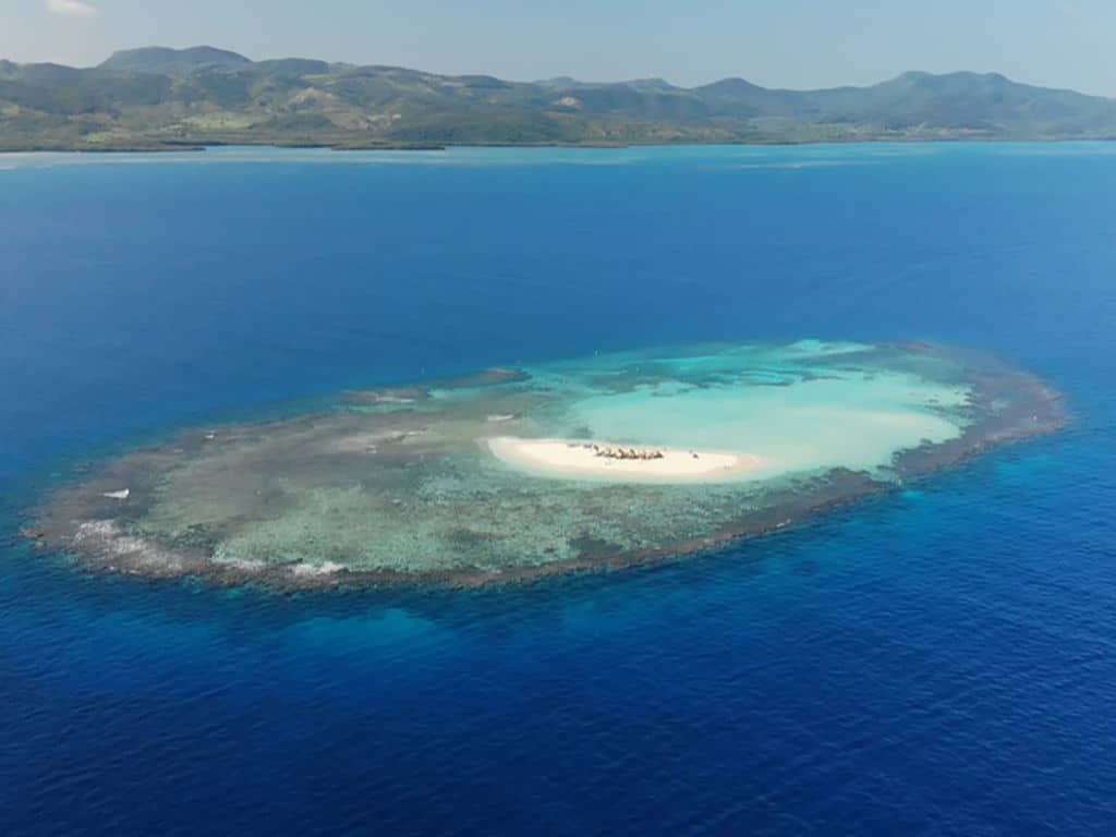 An aerial view of an island in the Caribbean.