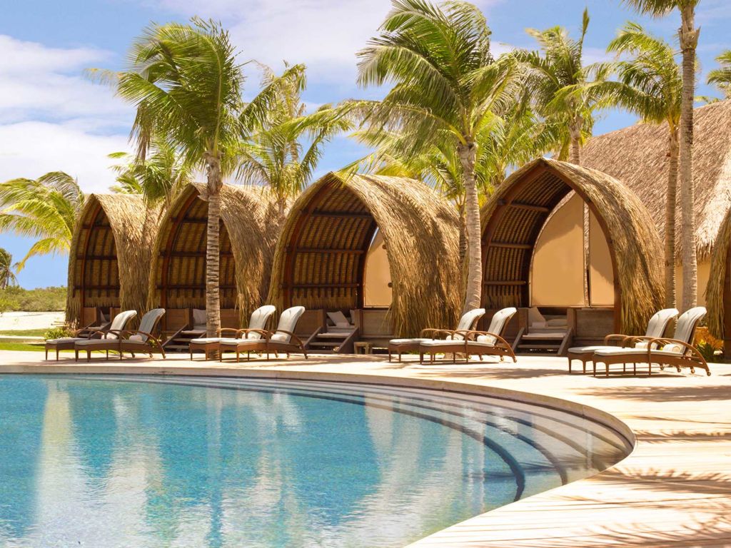 A beach-side bungalow area at an island beach resort.