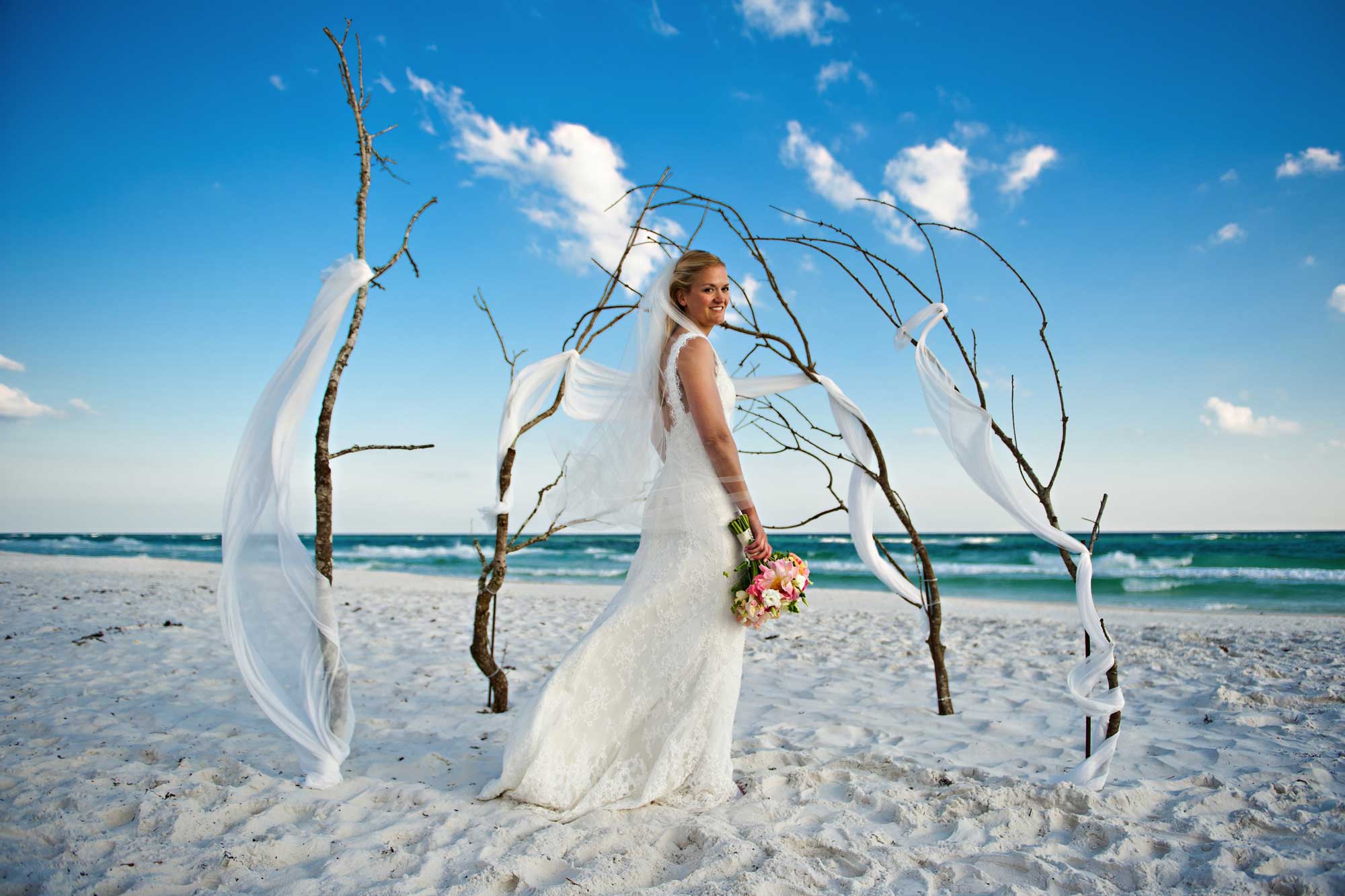 https://www.islands.com/wp-content/uploads/2021/09/the-best-wedding-venues-romantic-views09julie-twig-arbor.jpg
