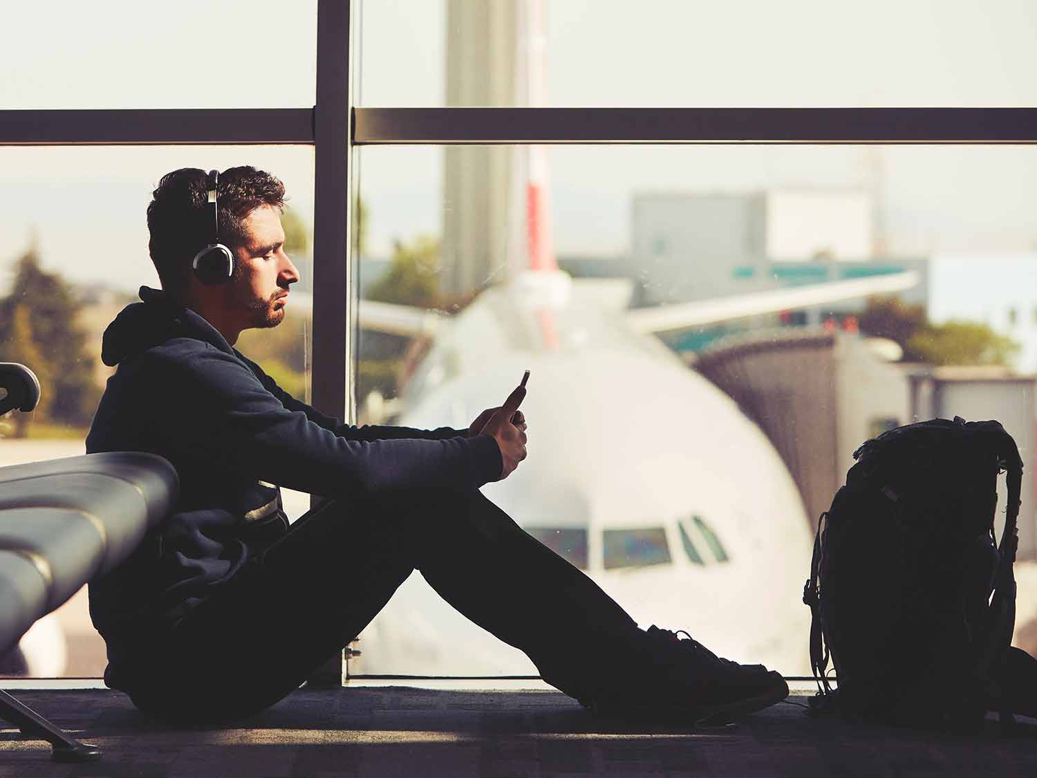man sitting in airport